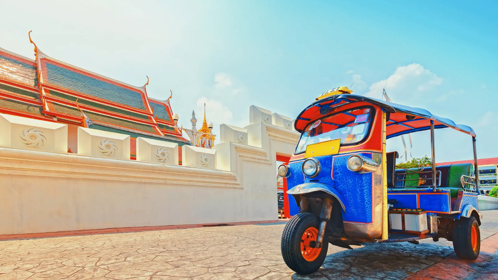 Tuk-tuk in front of Wat Pho temple, Bangkok