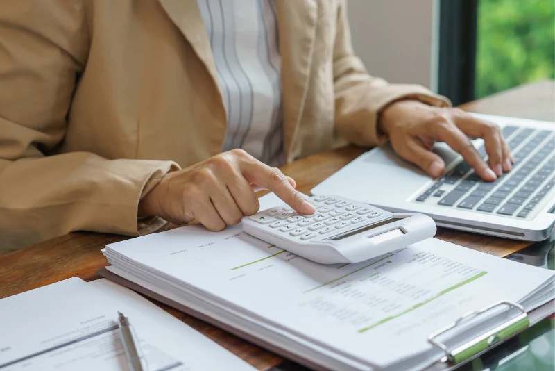 Digital nomad managing remote work finances and tax planning from Thailand